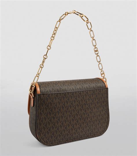 saddle bags michael kors|Michael Kors triple compartment bag.